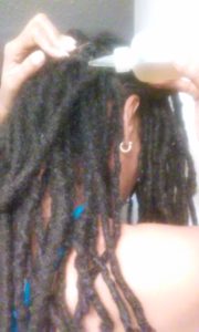 Applying Castor Oil and Coconut Oil to Scalp